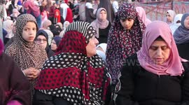 Palestinians attend Eid al-Fitr prayer which mark the end of the Holy month of Ramadan in Gaza city