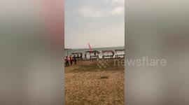 Sudden tropical storm uproots markets stalls in northeast Thailand