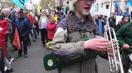 Music, performance art & caricature perfomances from the climate protesters today in London