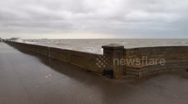 Waves crash over sea defences in Cleethorpes following strong winds and high tides