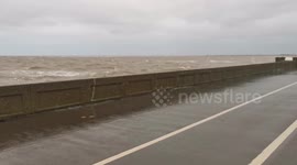 Waves crash over sea defences in Cleethorpes following strong winds and high tides