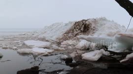 Massive mounds of ice sheets surface in Lake Superior near Ashland, Wisconsin