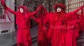 Climate change protesters gather for Earth Day demonstration in London