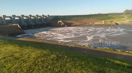 Hugo Lake Dam releasing flood water through all 6 flood gates into the Kiamichi River