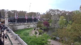 British flags line The Mall ahead of the TCS London Marathon 2023