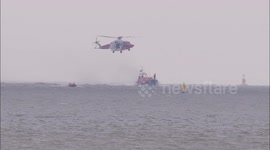 Lifeboat crews train with Coastguard helicopter off Kent, UK