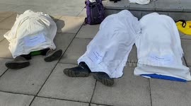 Extinction Rebellion activists pose as dead bodies outside UK Home Office