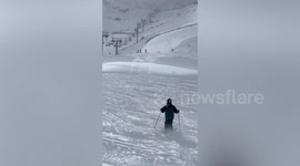 Skier plunges head-first into snow while trying backflip in France