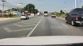 Stubborn drivers steer cars in sync into fuel station