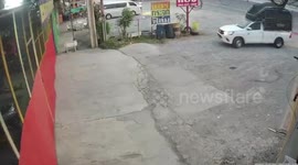 Bungling driver crashes pickup truck into shop doors in Thailand