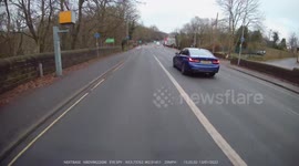 BMW Driver slows for a fixed speed camera and then speeds off