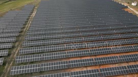 Aerial drone footage captures solar panels seen at a solar farm in Spain