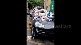 Porsche found parked in fire lane with rubbish piled on top in China