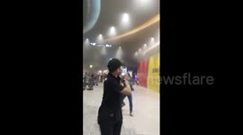 Shoppers shout while fleeing in panic as blaze breaks out at shopping mall in Indonesia