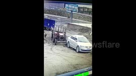 Dog accidentally starts tractor seeing it crash into car in China