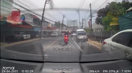 Distracted motorcycle rider slams into back of car while using his phone