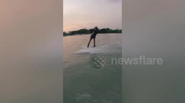Extreme sports fan slams on water in painful wakeboarding fail