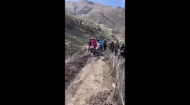 DANGEROUS! Rider on galloping horse violently knocks down motorcyclist standing across track in Russia