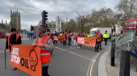 Just Stop Oil protesters block traffic in Westminster, London during morning rush-hour