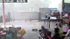 Storm batters home as heat wave subsides and rain arrives in Thailand