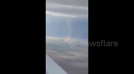 Landspout tornado spotted from plane near Denver, Colorado