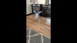 Excited twin boys head downstairs to meet their brother after his nap time