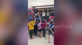 Rampaging cows interrupt street party during Thai festival
