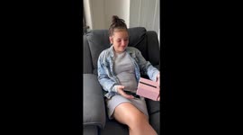 Girl is moved to tears after being surprised with a bangle containing her late sister's ashes