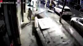 Chinese woman narrowly escapes death as giant billboard collapses