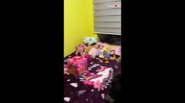 Little girl is surprised with a cute puppy by parents