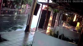 Bus loses control on slippery road and smashes rear on electric pole
