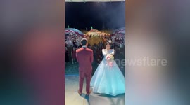 Bouquet bounces back to bride in wedding flower-throwing fail