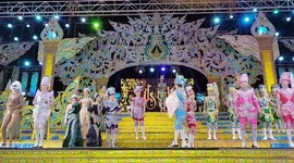 Performers in elaborate costumes perform on stage at an Isaan Mor Lam concert in Pattaya, Thailand