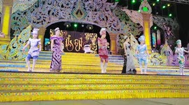 Performers in elaborate costumes perform on stage at an Isaan Mor Lam concert in Pattaya, Thailand