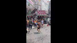 Man is rescued by helpful Thai people after getting flip-flop stuck on his foot during Songkran
