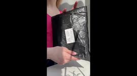 ASMR unpacking a parcel from an online store.