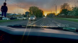 An evening car ride through the streets of the city in the rain