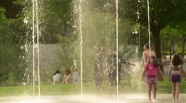 Madrid locals cool down in fountains as Spain experiences heatwave