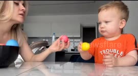 Easter egg fun with Arseniy: a toddler's joyful egg-tapping adventure