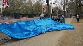 Royal Superfans John Loughrey and Skye put up their Royal flags on their campsite (known as The Buck house Hotel) to see the Kings Coronation