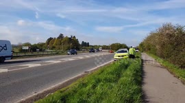 Police car hitsa man hole cover sticking up in a live lane of the A12 in Kelvedon causing long delays