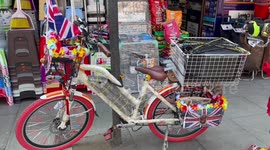 Man decorates bike, dresses up for upcoming Coronation of King Charles III