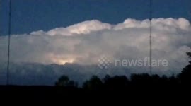 Intense, hellacious lightning lingers behind huge storm cloud in North Carolina