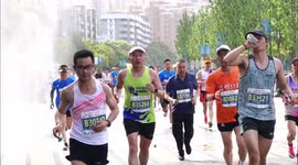 People Join Yichang Marathon in China