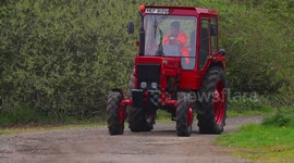 Tractors gather at an airfield for charity Tractor run in North Yorkshire