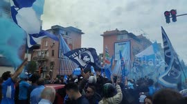 Napoli fans, celebrate outside in the city streets the almost victory of the Italian SerieA championship, during the Napoli vs Salernitana match, which was held at the Diego Armando Maradona stadium.
