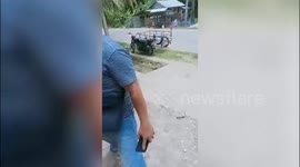 Residents flee as gunfight erupts between soldiers and communist rebels in the Philippines
