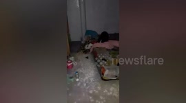 Resident wakes up to rain pouring from ceiling into his room