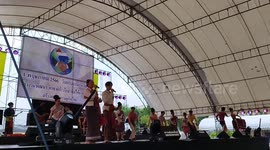 Dancers in traditional Thai costumes perform at a Labour Day event in Bangkok, Thailand
