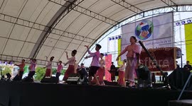 Dancers in traditional Thai costumes perform at a Labour Day event in Bangkok, Thailand